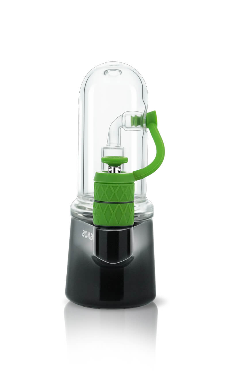 A direct front view of the Bomb Erig Aerix, emphasizing the 360° rotatable green carb cap and the clear glass percolation chamber. This perspective showcases the ergonomic symmetry of the device and its high-end finish.