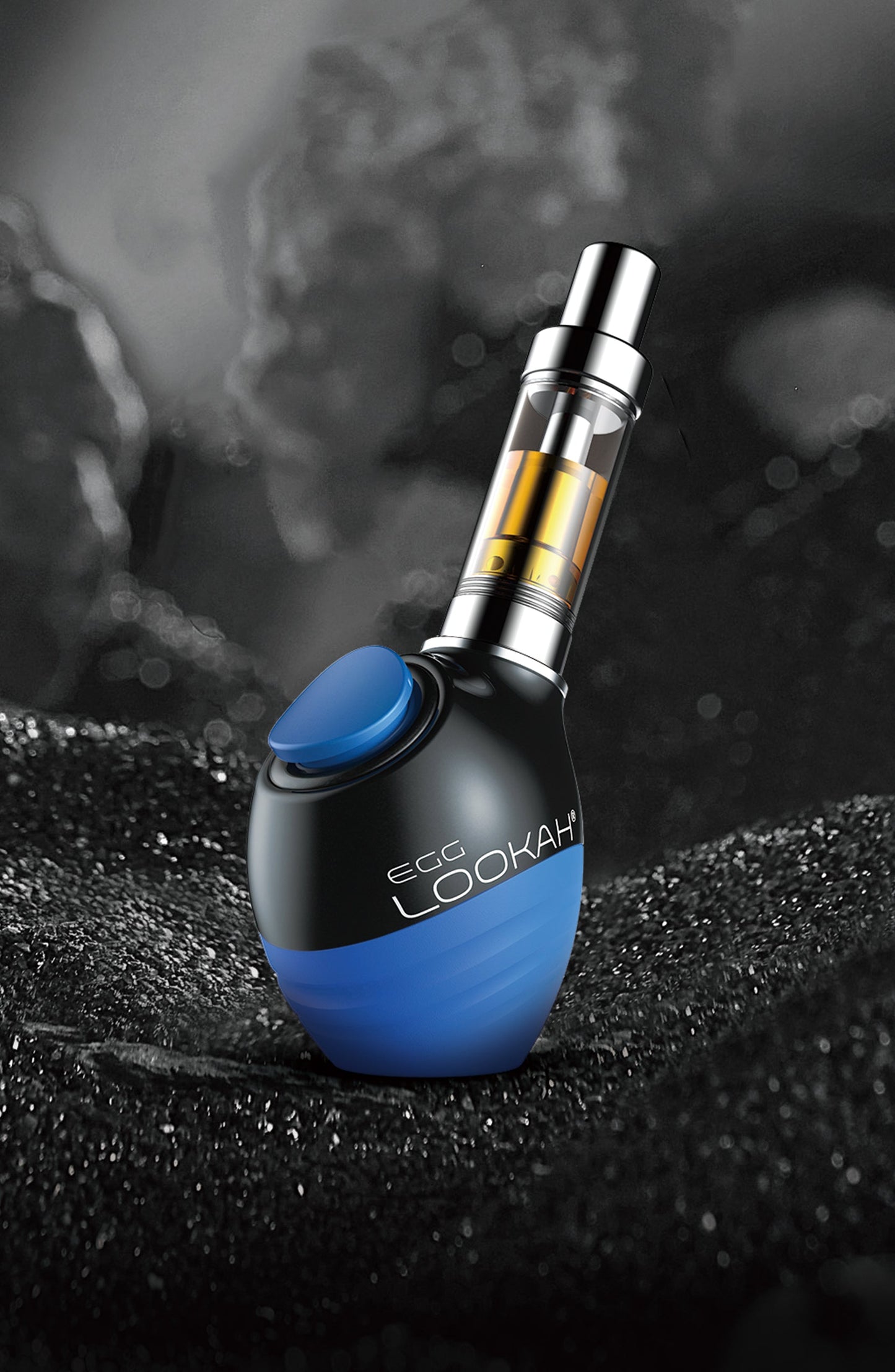LOOKAH Egg 510 battery in Blue shown in use with an oil cartridge, demonstrating its stable, upright-standing capability on a textured surface.