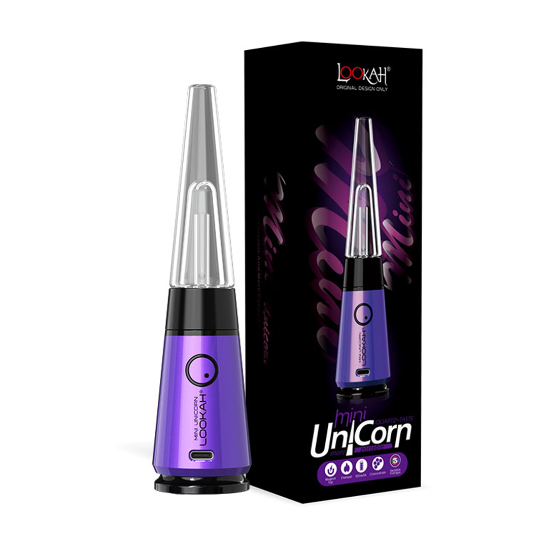A crisp studio product shot highlighting the LOOKAH Mini Unicorn Vaporizer in Purple positioned next to its branded retail cardboard box. The shot captures the deep royal purple colorway of the smart concentrate vaporizer base, showcasing the premium travel-friendly design and secure glass attachment configuration.