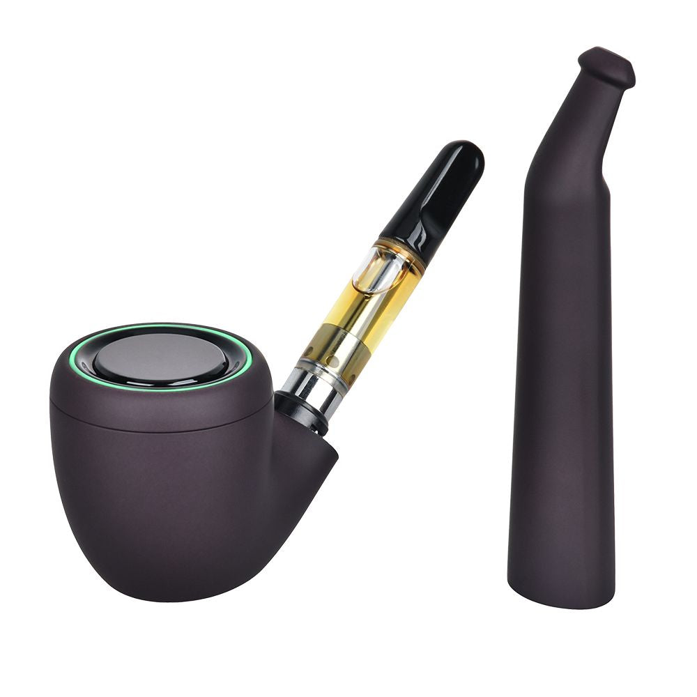 A close-up studio product shot of the Pulsar 510 DL Pipe in Thermo Phantasmal Force (Plum Wild) in its cold state. The device is shown in solid black with its stem mouthpiece detached and resting nearby, cleanly exposing a standard 510-threaded oil cartridge threaded into the concealed interior chamber of the pipe bowl.