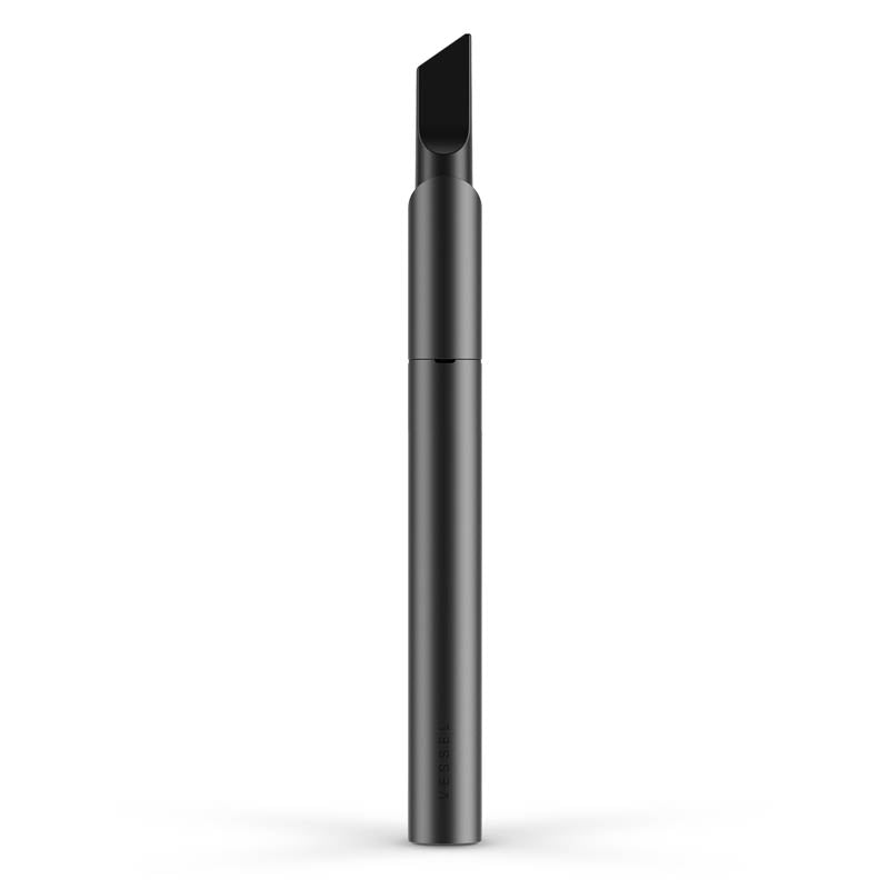 A clean, rear-facing studio shot of the Vessel Vista Edge vape pen in Slate. The device stands vertically, showcasing the completely solid, smooth slate-gray back panel, its seamless unibody appearance, and the clean geometric lines of the integrated bottom magnetic charging contact array.