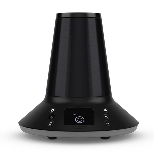 A front-facing studio product shot of the Arizer XQ2 Desktop Vaporizer standing upright with its ambient base ring glowing a sleek, cool gray. The midnight-black cylindrical dome device highlights its integrated digital control screen on the front panel and showcases a glass adapter piece mounted inside the top heating chamber port on a clean white background.