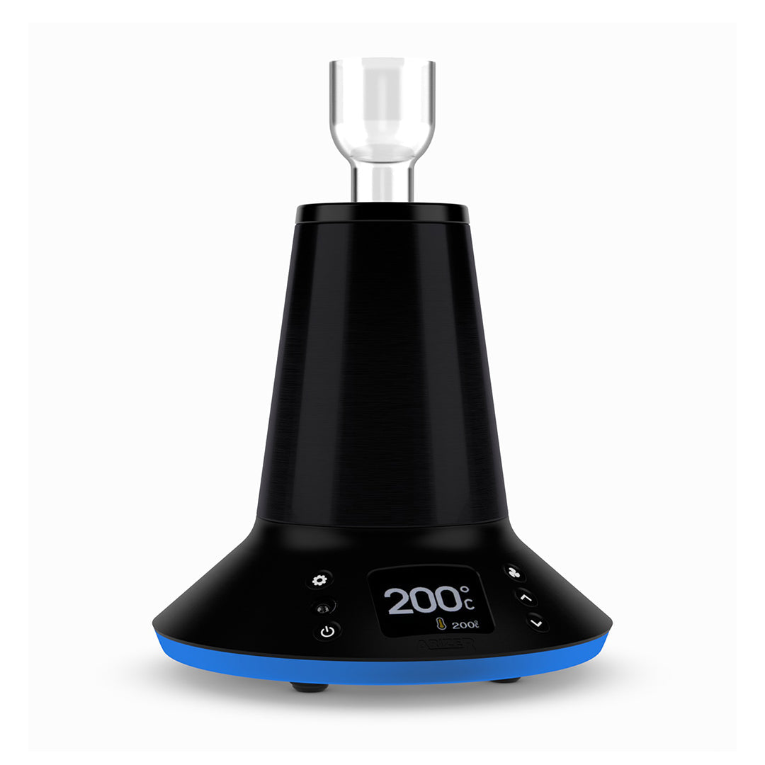 A detailed studio product shot highlighting the Arizer XQ2 heating port with the Glass Connoisseur Bowl installed. The clear borosilicate glass bowl sits securely inside the top opening of the black desktop vaporizer, featuring a black high-heat resistant silicone Tuff Bowl Grip band around the glass for safe handling during sessions.