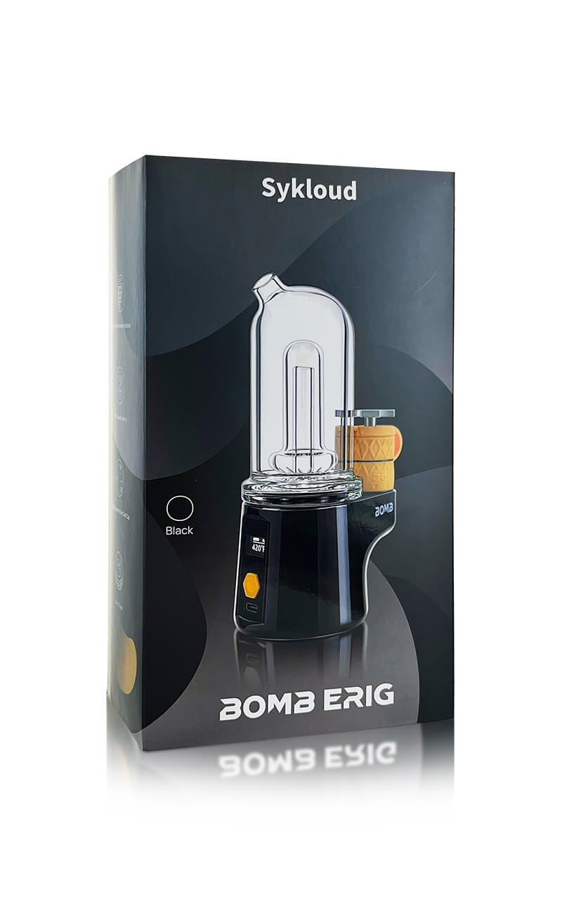 A high-resolution product shot displaying the official retail packaging for the BOMB ERIG Sykloud in Black. The sleek black box features "Sykloud" and "BOMB ERIG" branding, a color indicator circle marked "Black," and a studio photo of the complete e-rig unit with its screen illuminated.