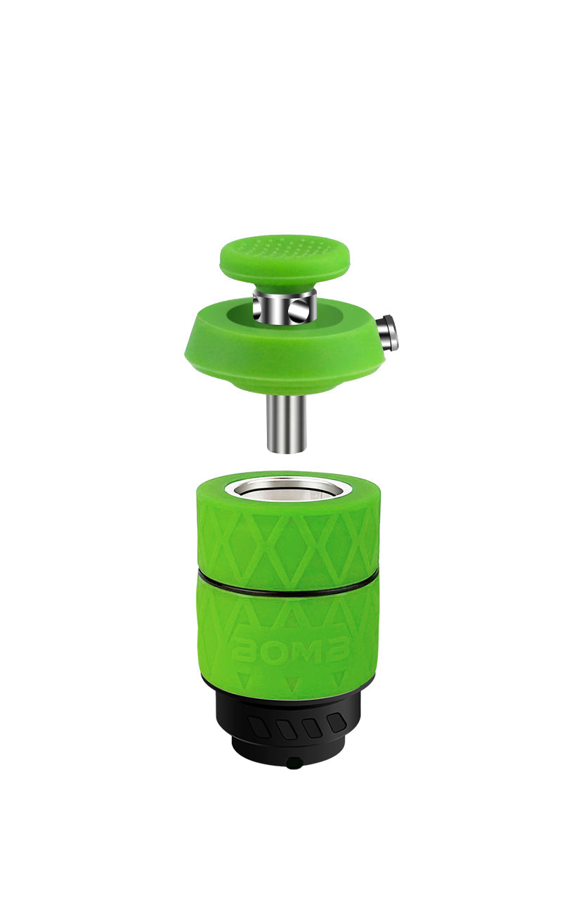 A technical "exploded" view of the Bomb Erig Aerix Atomizer. The green carb cap is shown hovering above the ceramic chamber, illustrating how the 360° rotatable cap sits atop the atomizer for precision airflow control.