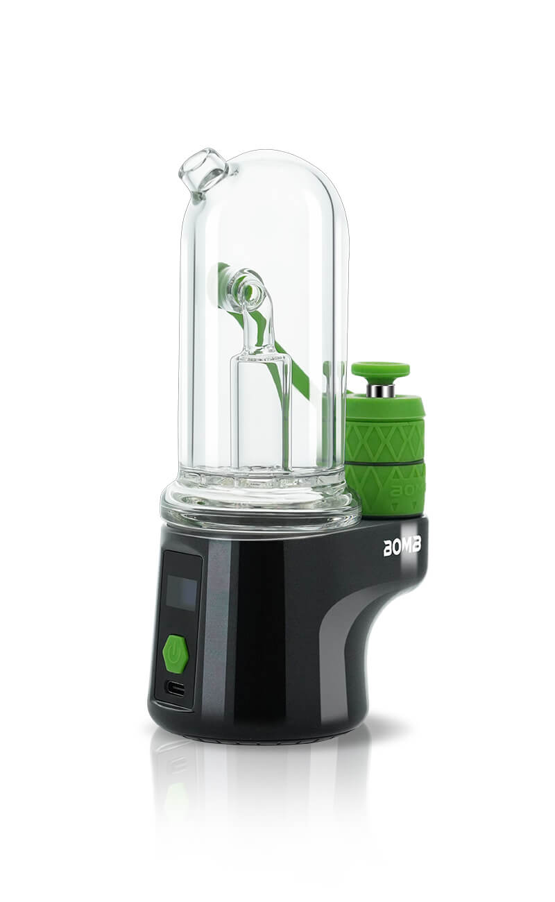 An angled side view of the Bomb Erig Aerix highlighting the user interface. This image shows the digital display screen, the tactile control button, and the USB-C rapid charging port, while providing a clear look at how the green airpath tube connects the atomizer to the glass.