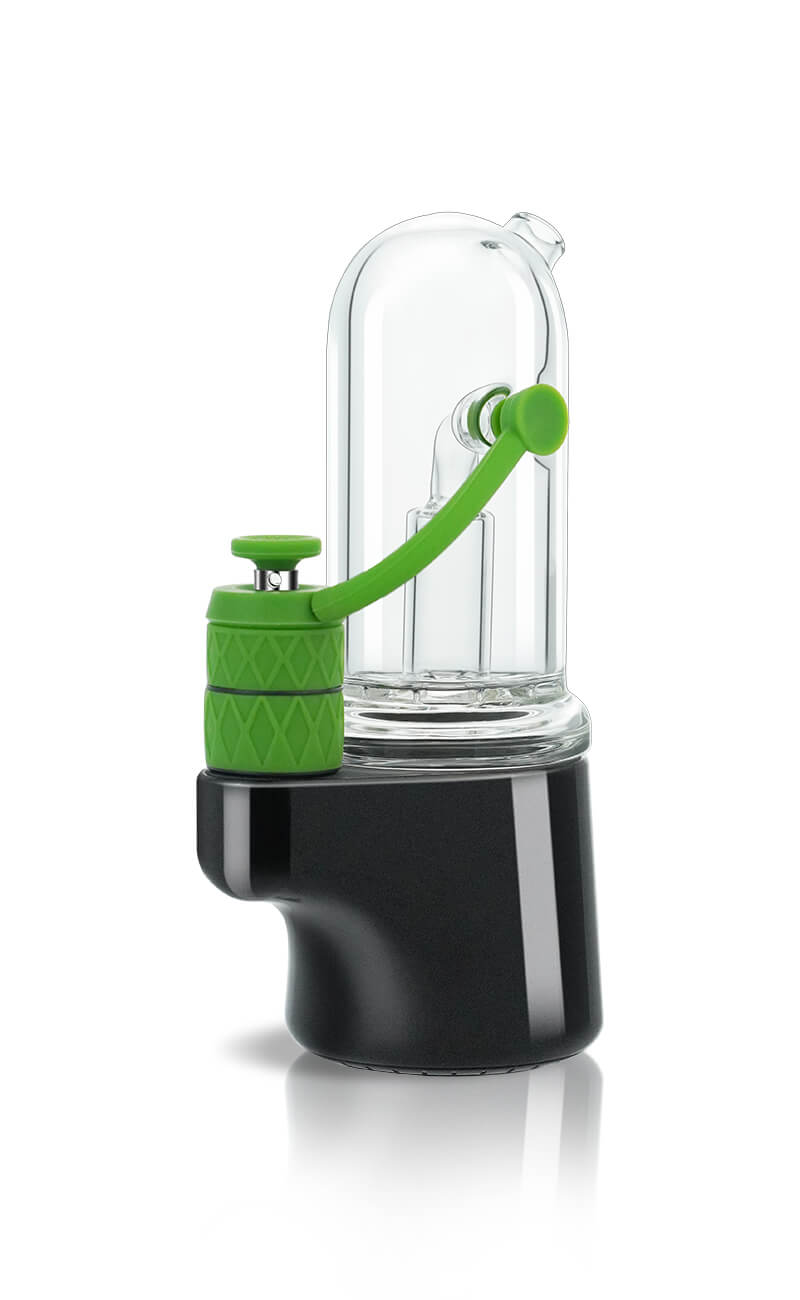 A side-angled view of the Bomb Erig Aerix showing the clean, minimalist side of the black base. This shot provides a detailed look at how the vibrant green airpath tube bridges the gap between the atomizer and the glass bubbler, perfectly illustrating the external bypass design.