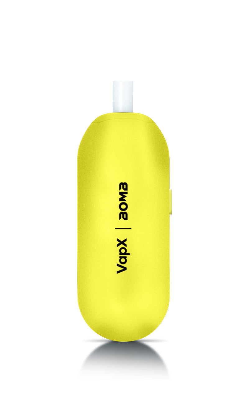 The back of the Liquid Lemon Magic Bean, prominently featuring the official Bomb and VapX brand logos. The image showcases the smooth, ergonomic finish of the limited-edition yellow chassis.