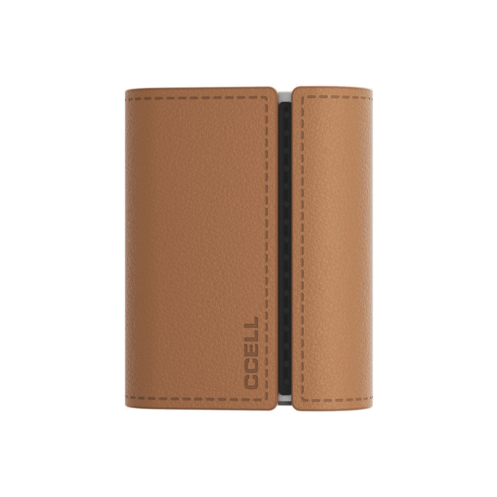 A crisp studio shot of the CCELL Fino in Cocoa with Moon Gray. The complete modular unit is shown fully encased inside its rich, soft brown faux-leather wallet sleeve with the magnetic cover flap securely closed.