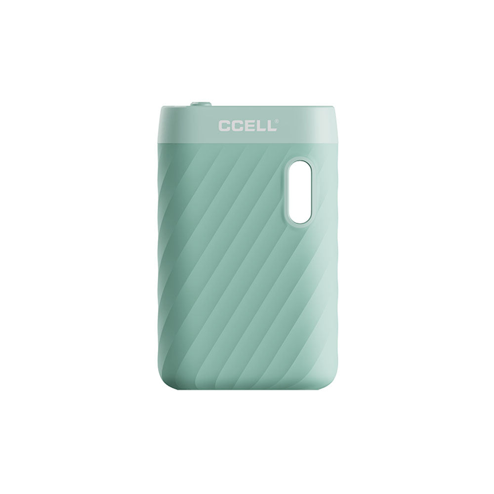 A front-facing studio profile shot of the CCELL Sandwave in Mint Green. The device features a light, refreshing pastel mint green matte finish across its ridged body, showcasing the top mechanical voltage slide toggle and clean design symmetry.