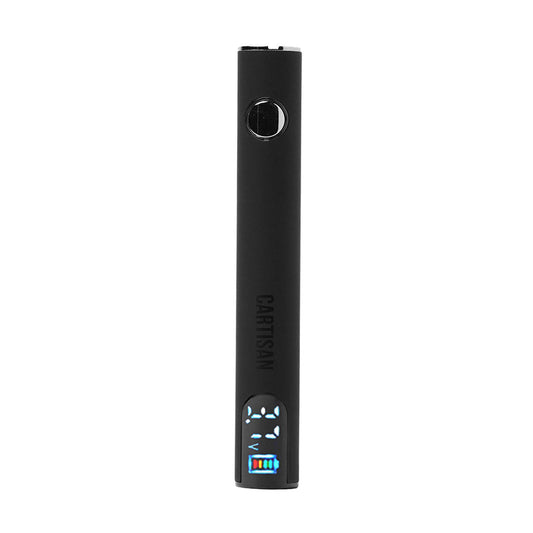 A front-facing studio shot of the Cartisan Pro Pen NEO 650 in Black. This sleek, pen-style 510 battery features a matte black finish, a circular firing button, and a vibrant color digital display at the base showing the voltage setting and battery life.