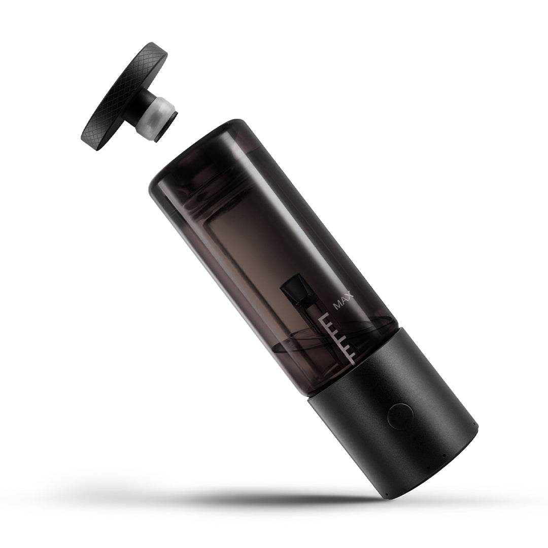 A dynamic, angled studio layout displaying the Cloudious9 Carti9 vape with its top cap assembly removed. The upper metallic cap with its internal leak-resistant silicone seal hovers directly above the clear borosilicate glass water tube, showcasing the internal chamber where a 510 cartridge is housed and filtered.