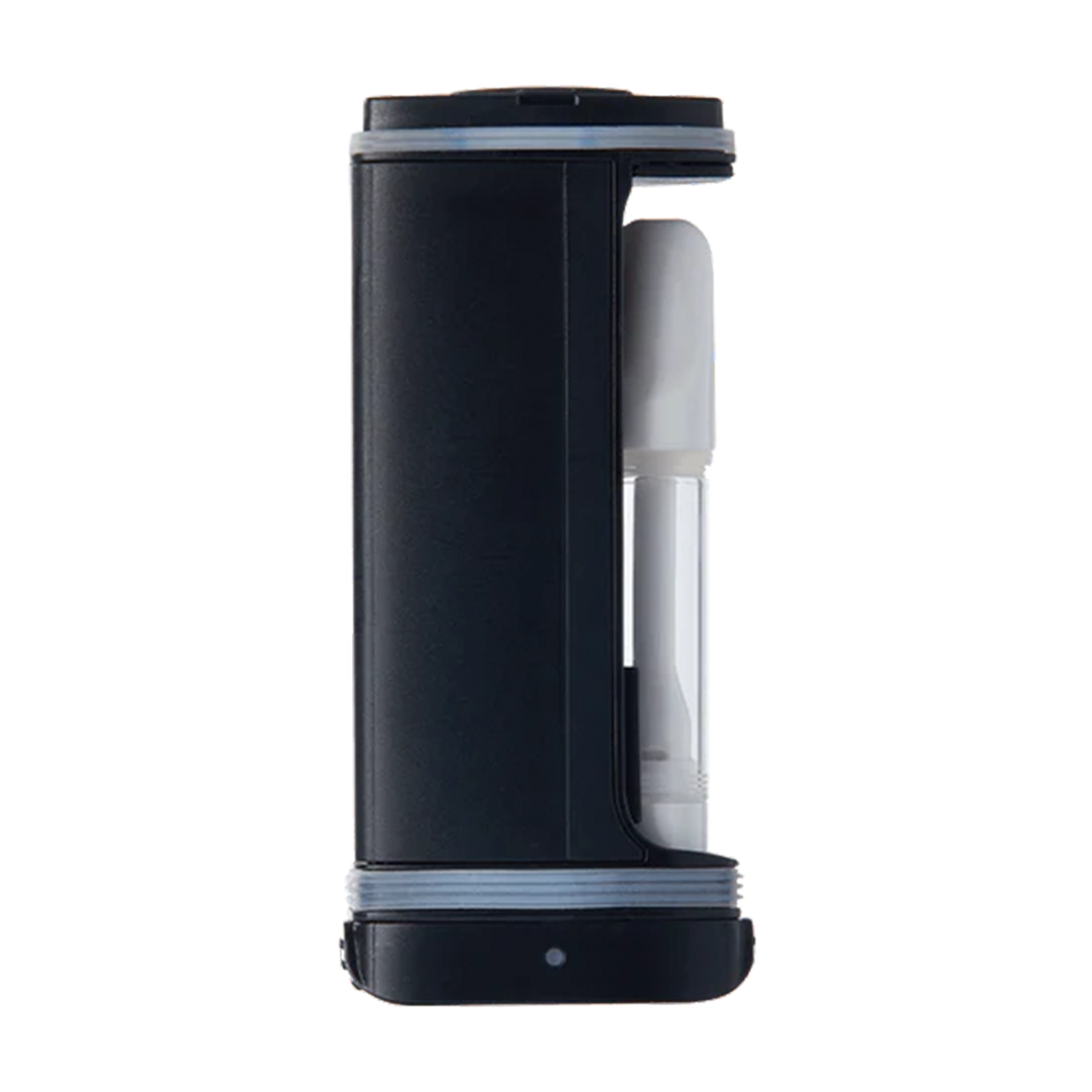 A front-facing studio shot of the DaVinci ARTIQ with its outer shell removed, showcasing a clear glass 510-thread oil cartridge locked into the magnetic chamber. The image clearly displays the inner mechanical housing, the rubber gasket seals, and the bottom-mounted connection plate that stabilizes the cartridge.