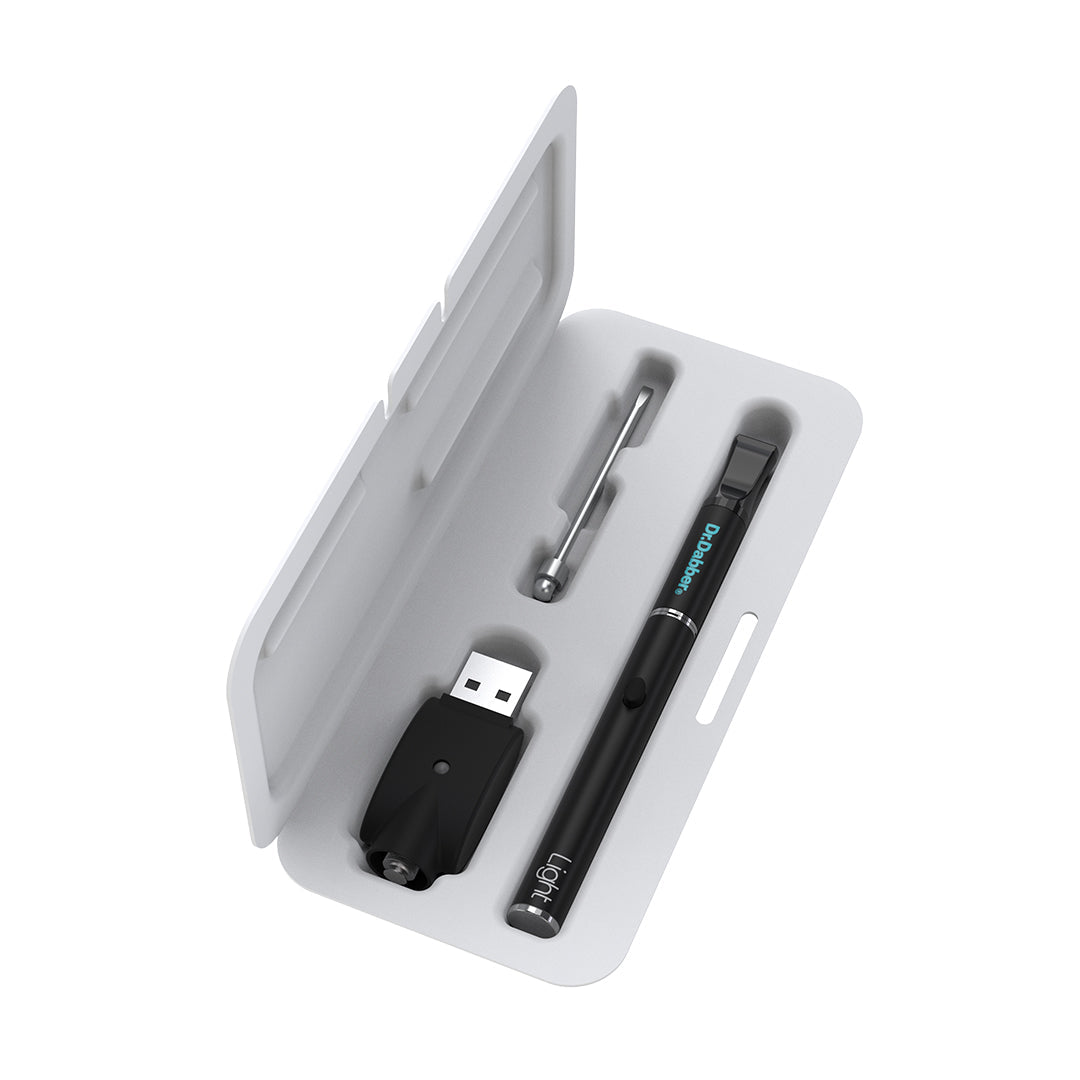 Complete Dr. Dabber Light™ Vaporizer Kit including the slim battery, atomizer with mouthpiece, loading tool, and USB charger.