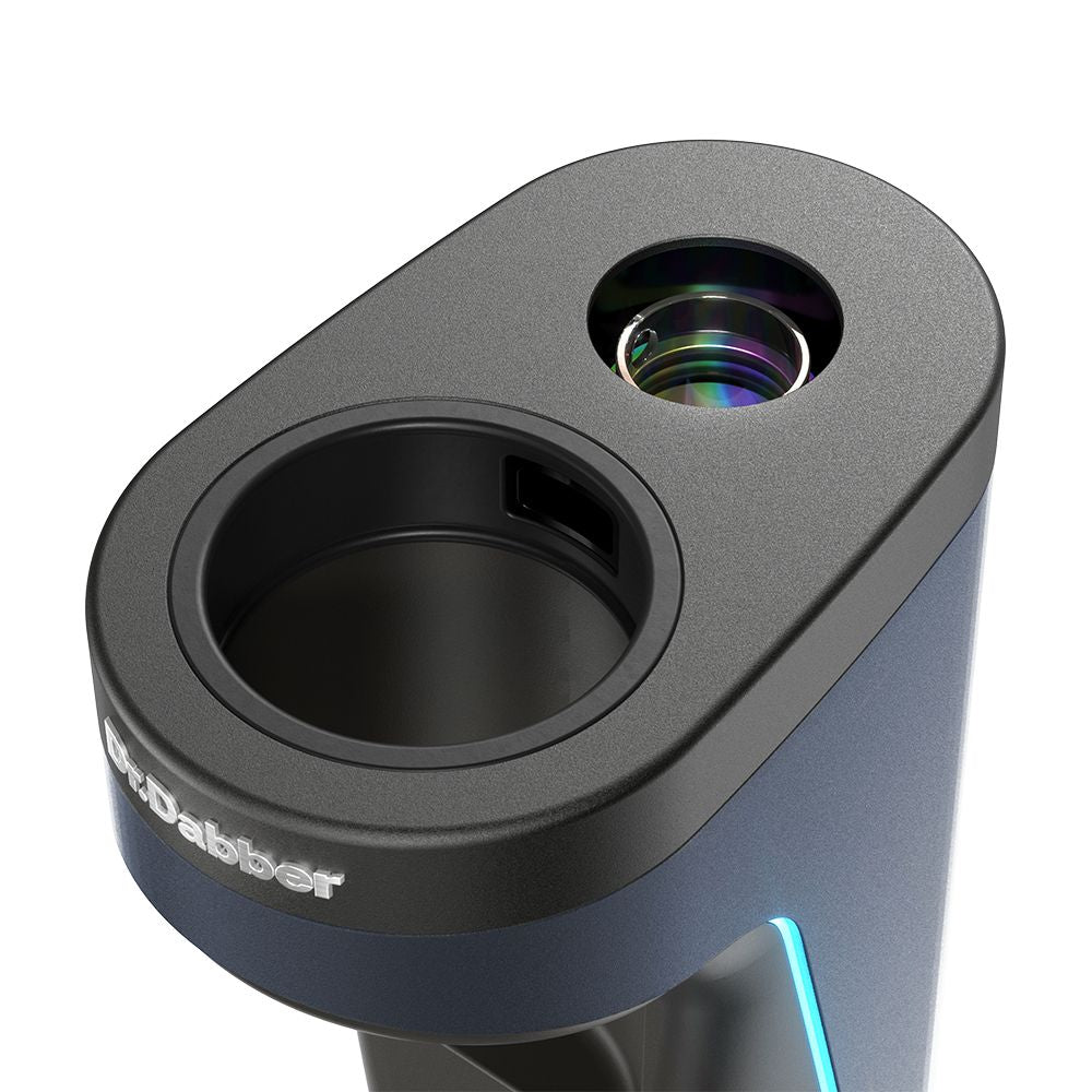 A crisp overhead close-up shot focusing on the glass bubbler connection seat and quartz insert housing on top of the Dr. Dabber Switch²™. The angle captures the silicone sealing ring, the induction heating chamber aperture, and the precise fitting mechanism for the borosilicate glass attachment.