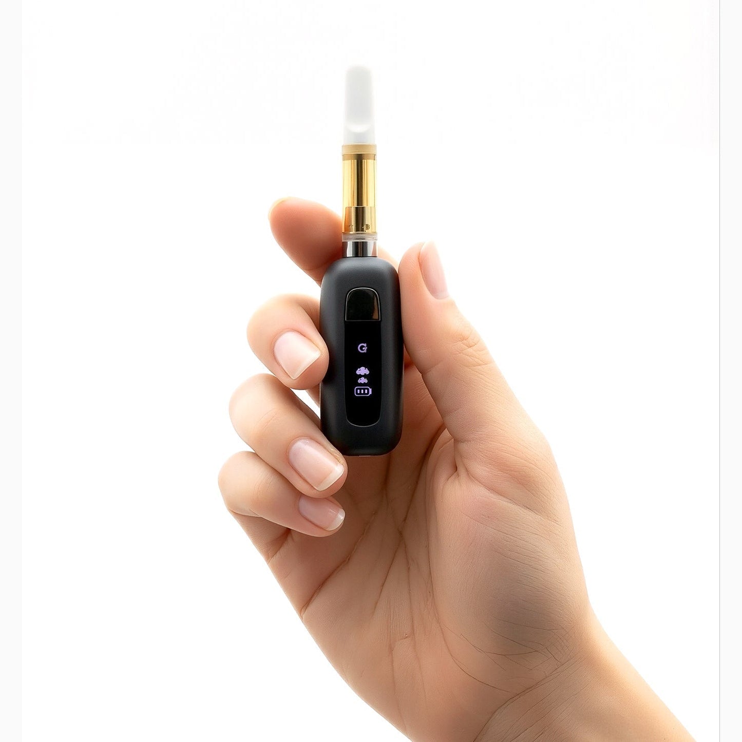 Handheld scale shot of the G Pen 510 Original with a cartridge attached, demonstrating it is the smallest G Pen battery ever made.