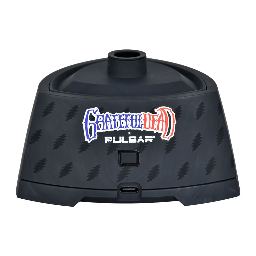 A straight front studio shot of the Grateful Dead x Pulsar Sipper vaporizer base with the glass cup removed. The image highlights the clean, official collaborative logo branding, the centralized circular touchpad control interface, and the side-mounted USB Type-C fast-charging port integrated seamlessly into the lightning-bolt-textured chassis.