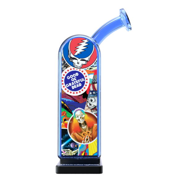 A detailed studio product shot displaying the opposite side profile of the Grateful Dead x Stündenglass Modül + Dok Legacy Patchwork device. This view showcases another angle of the continuous, colorful collage of official licensed band imagery wrapping the handheld docking base frame beneath the clean, clear borosilicate glass globe.
