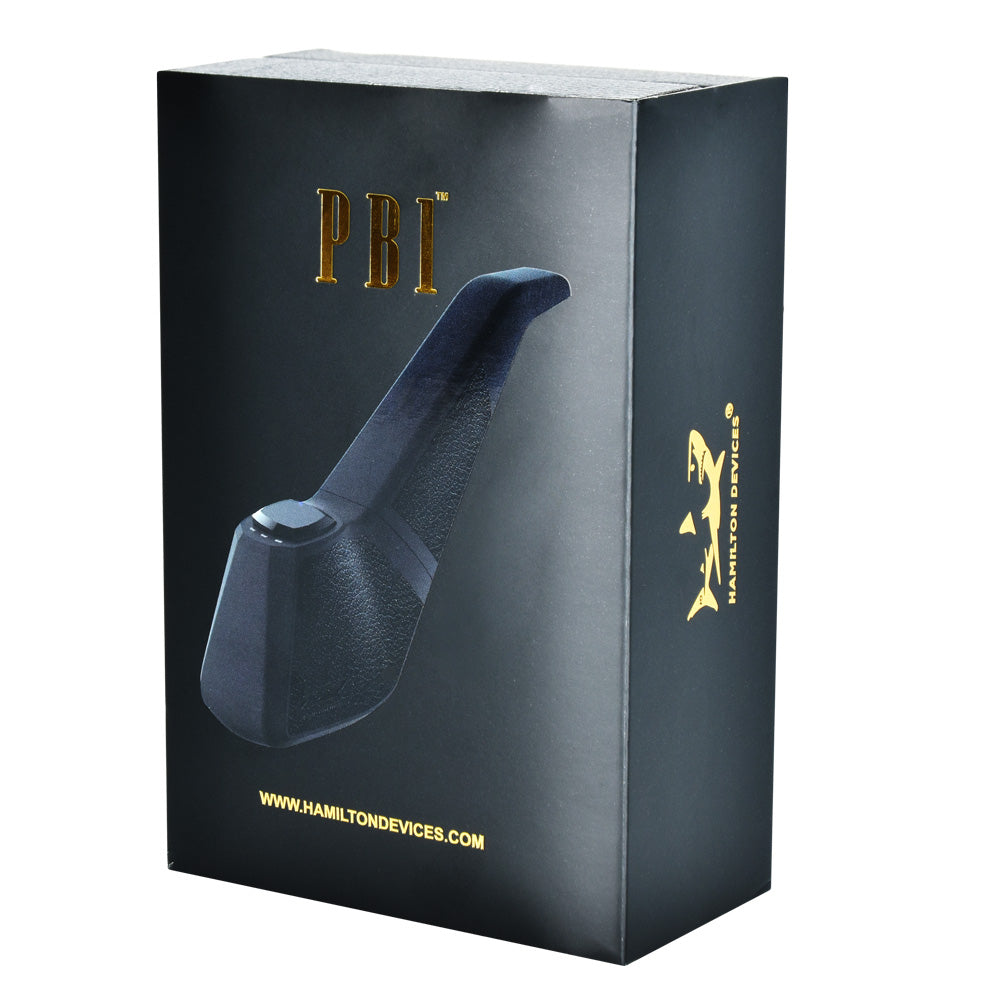 A clean, front-facing studio shot of the official Hamilton Devices PB1 Pipe Battery retail box. The minimalist black packaging highlights distinct gold and white metallic font graphics, emphasizing its sophisticated, high-end design.