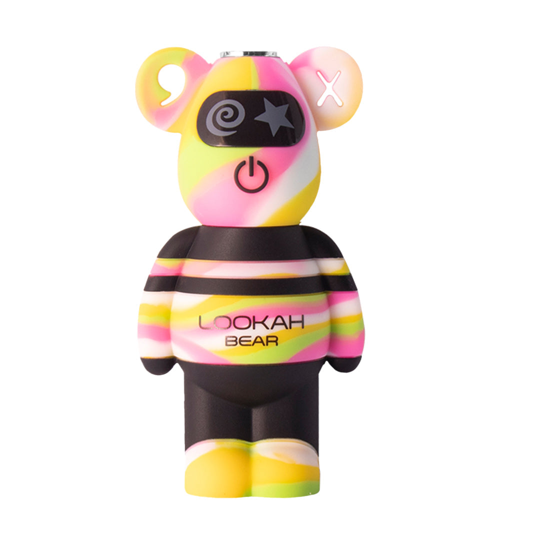 A front-facing shot of the Lookah Bear Battery in Pink Tiedye. This variant features a dynamic, multi-colored swirl pattern of pink, yellow, and white across the head, torso, and feet. The "face" design is unique to this model, featuring a glowing "X" in the left ear and the standard swirl-and-star eyes, highlighting its collectible, limited-edition feel.