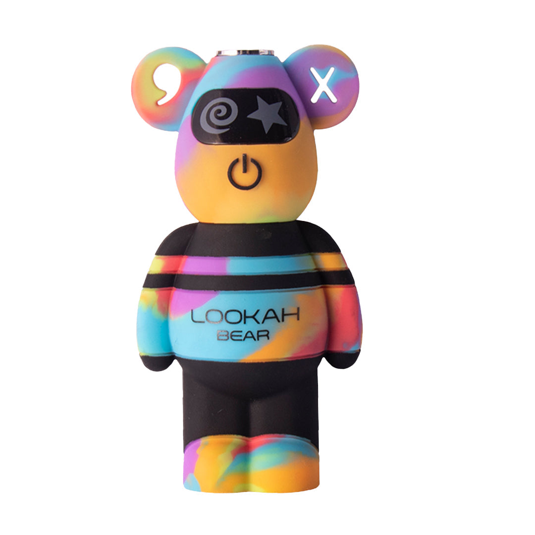 A front-facing shot of the Lookah Bear Battery in Yellow TieDye. This variant showcases a vibrant marbled pattern of yellow, blue, and pink swirls. The design features a glowing "X" in the right ear and the signature "LOOKAH BEAR" branding on the striped torso, emphasizing the unique, collectible aesthetic of the TieDye series for the Bong Bros catalog.