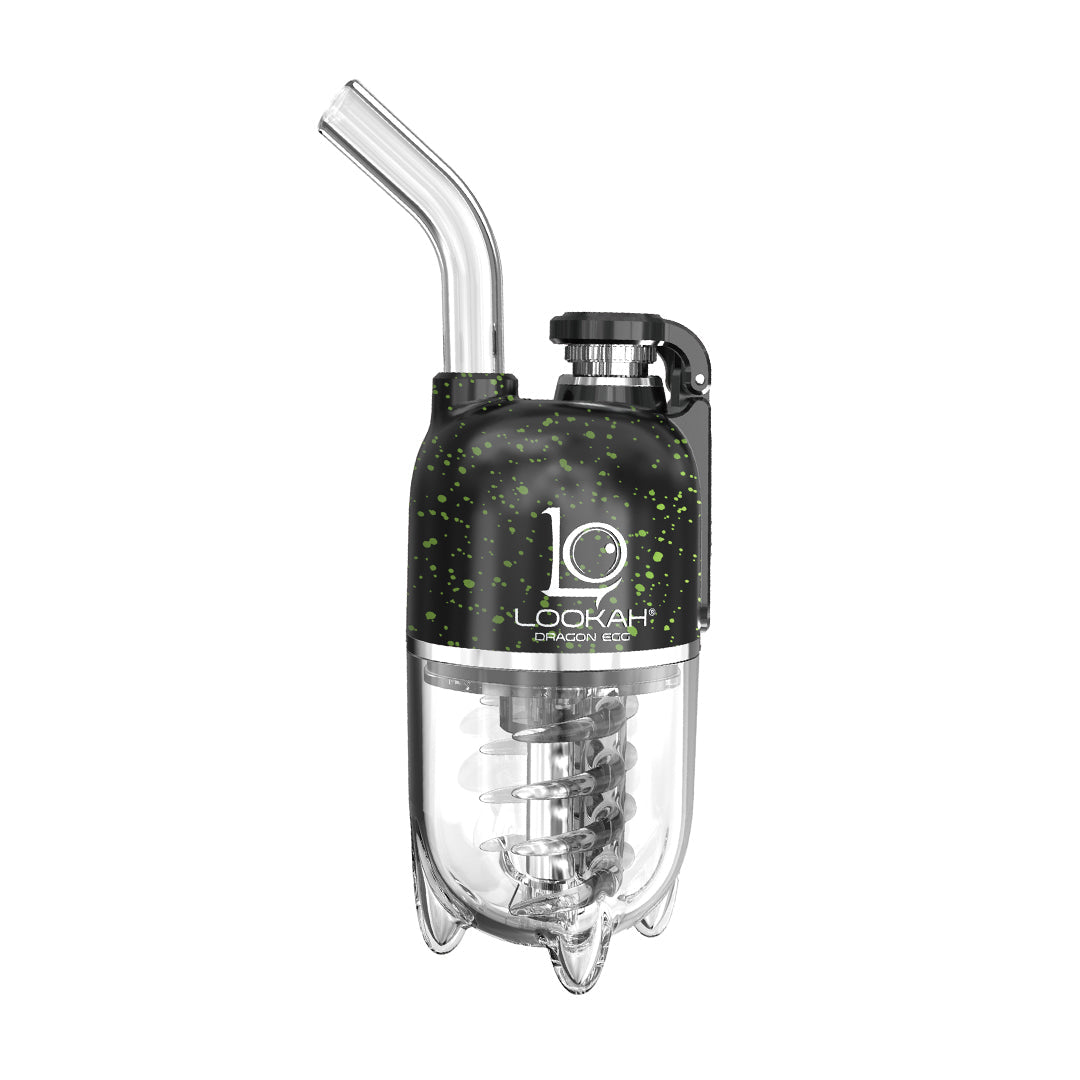 A crisp, front-facing studio product shot of the LOOKAH Dragon Egg Vaporizer in the Black-Green Spatter finish colorway. The assembled capsule e-rig features a stealthy black upper chassis covered in a vibrant, neon-green paint splatter pattern, contrasting beautifully with the clear, durable perspex water bubbler chamber base.