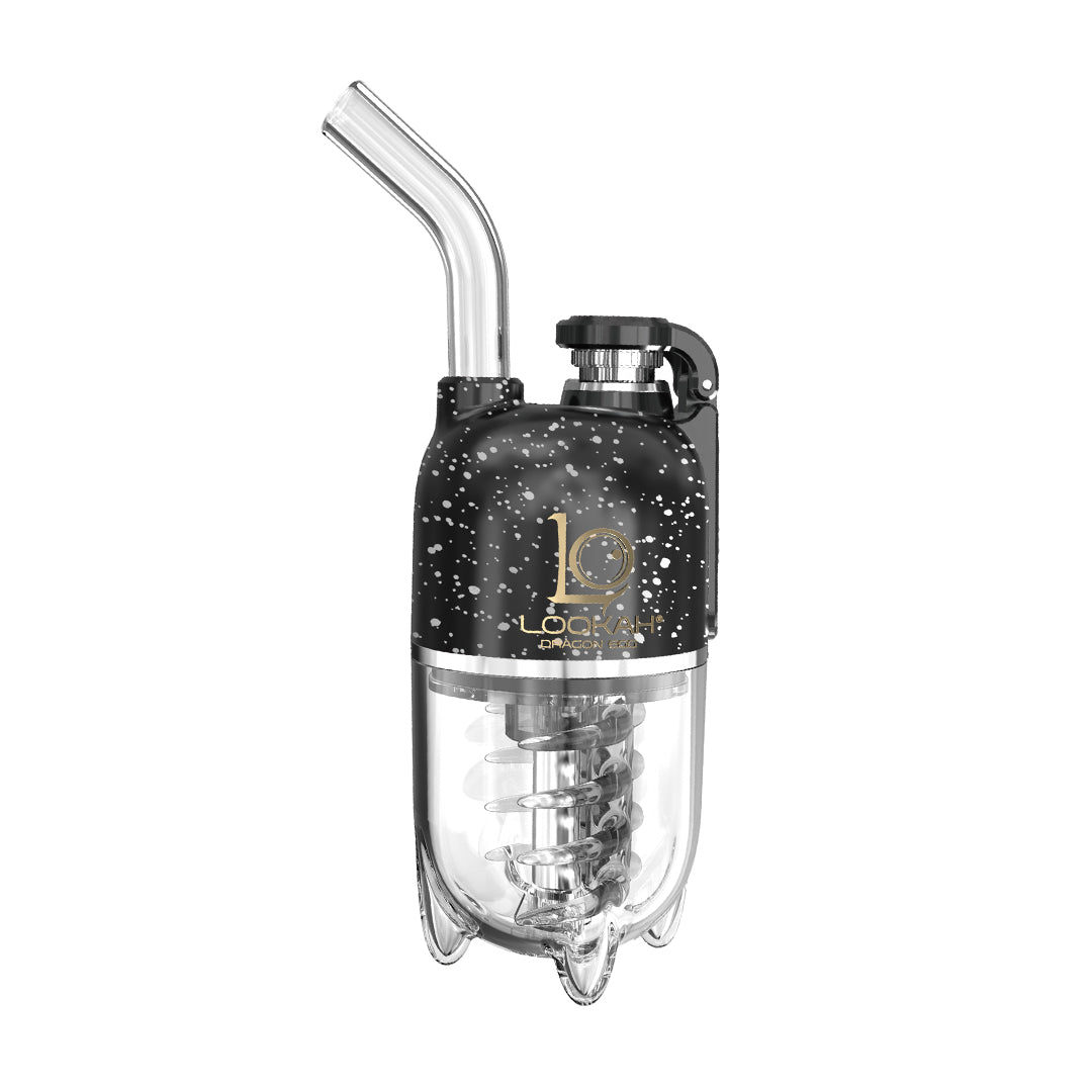 A detailed, front-facing studio product shot displaying the LOOKAH Dragon Egg Vaporizer in the rugged Black-Silver Spatter finish option. The capsule-shaped handheld e-rig highlights a dark matte black upper chassis adorned with a striking, metallic silver paint splatter pattern, contrasting neatly with the clear lower water filtration chamber.
