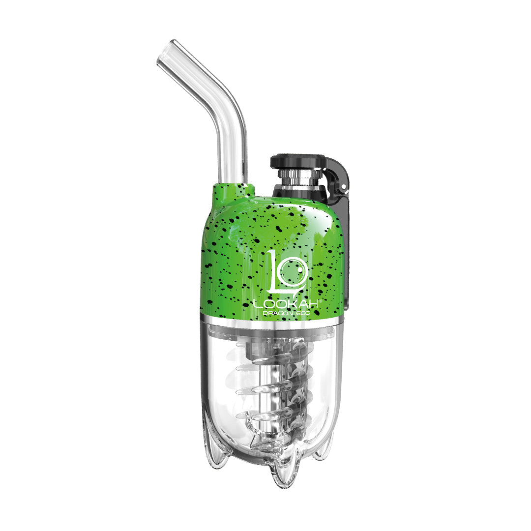 A detailed, front-facing studio product shot displaying the LOOKAH Dragon Egg Vaporizer in the Green-Black Spatter finish option. The image highlights the bright lime-green upper power housing unit decorated with a dark black paint splatter aesthetic, standing upright above its transparent lower water filtration reservoir on a clean background.