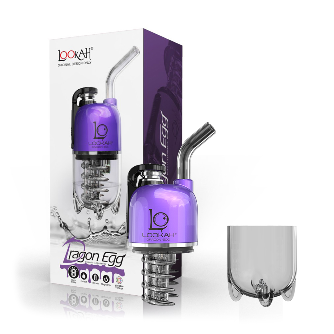 A detailed studio product layout showing the LOOKAH Dragon Egg Vaporizer in Purple disassembled in half next to its retail box. The image captures the royal purple finish of the top power housing unit separated from the transparent lower perspex water filtration base, neatly arranged alongside the official graphic cardboard packaging on a clean background.