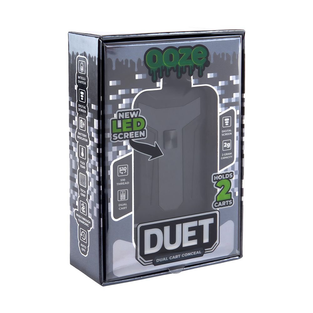 A straight front-facing studio product shot of the official Ooze Duet (Matte Black Edition) retail packaging. The custom cardboard box features prominent neon green and white Ooze branding, slick product graphics displaying the dual-cartridge design, and clear callouts for the 650mAh capacity and Flex Temp voltage levels.