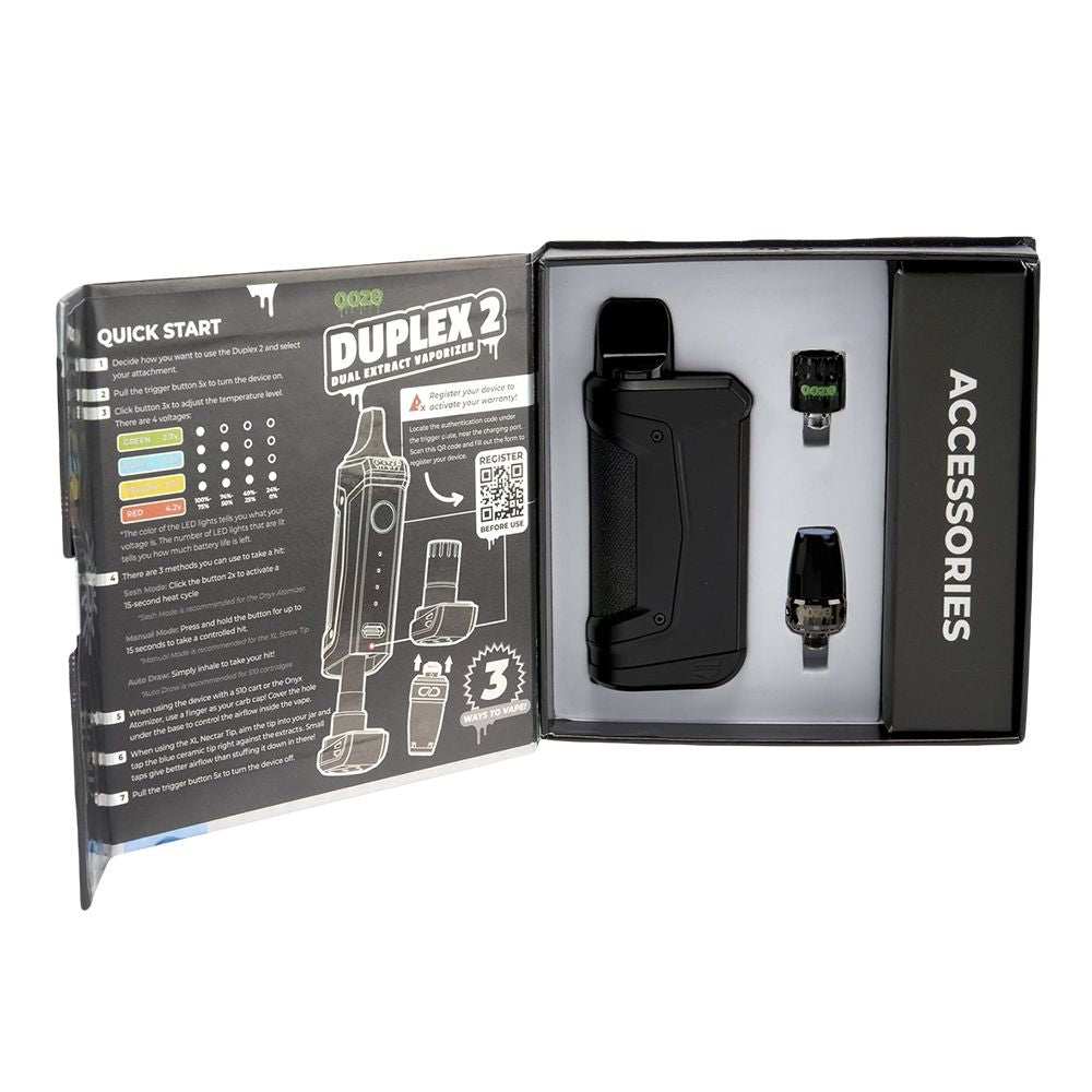 An unboxed view of the Ooze Duplex 2 kit in Arctic Blue, displaying all included accessories: the magnetic base, internal 510 tank, C-Core attachments, and USB-C cable.
