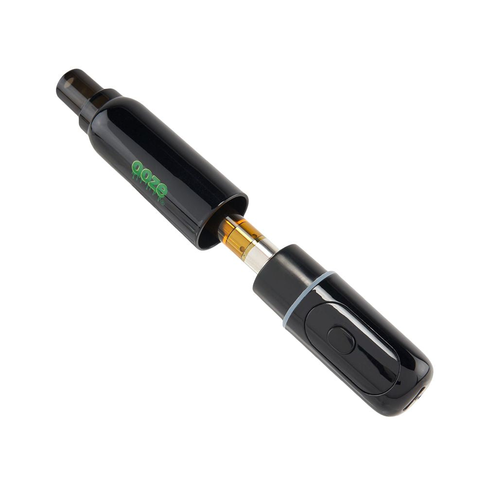 Side view of the Ooze Hivo with the top cover partially detached, illustrating the compact, stubby pen design and strong magnetic connection.