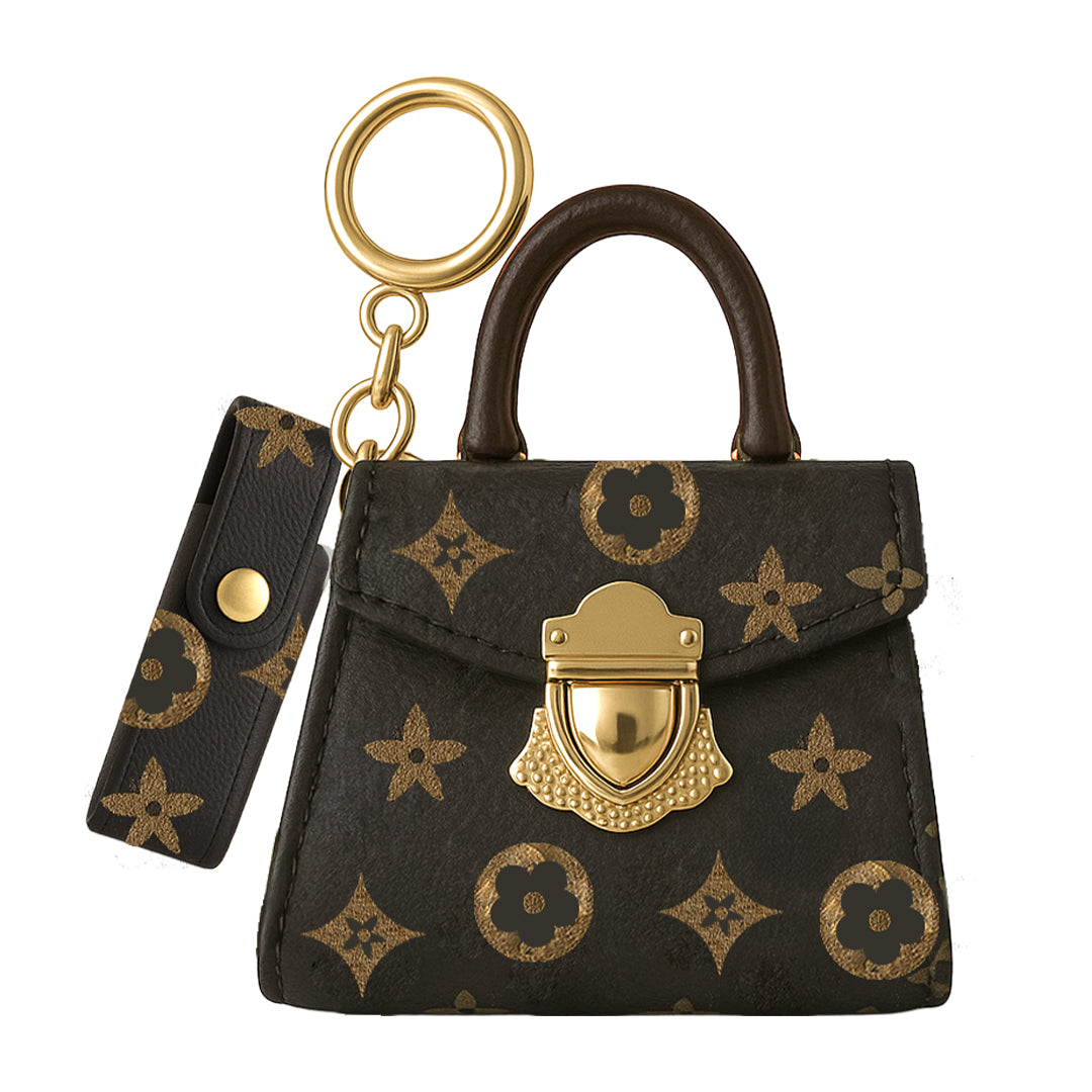 Mini designer-inspired monogram print 510 vape battery keychain holder, equipped with a gold heart-shaped lock and holding a cartridge.
