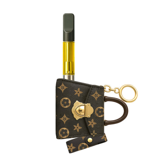 Penjamin Pursejamin keychain vape battery in a brown monogram designer print, featuring a gold-tone clasp and an upright 510 thread cartridge port for discrete portability.