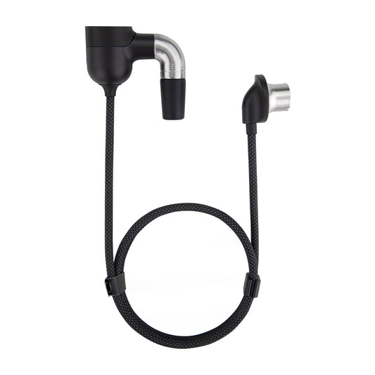 A clean front-facing studio product shot displaying the Puffco Peak Pro Link adapter kit. The shot showcases the sleek black adapter setup with its 30-inch insulated extension cable running between the rig adapter end and the device connection point, laid out neatly on a solid background alongside its weighted desktop rest stand.