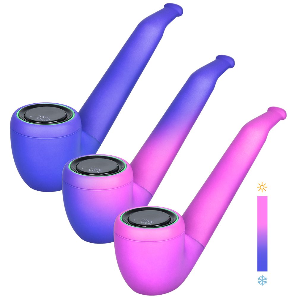 A front-angle studio product shot of the Pulsar 510 DL Pipe in Thermo Royal Wizard, capturing the heat-reactive thermochromic material mid-transition. The body shows a vibrant gradient shift from its cold royal blue-purple base color to a bright pink shade where warmth is applied, emphasizing the interactive design along the contours of the pipe bowl.