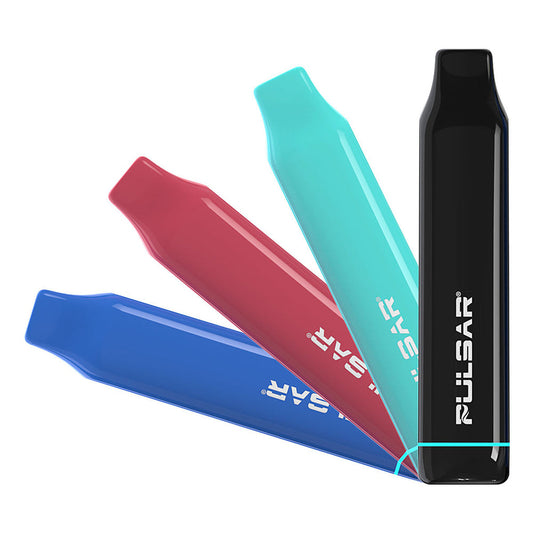 A clean studio product shot showcasing four colorways of the Pulsar 510 DL Lite vape pen standing vertically side-by-side. The image displays the sleek, minimalist bar-style devices in their smooth, uniform solid finishes, showcasing the lineup from left to right in Matte Black, soft Mint Green, vivid Crimson Red, and deep Royal Blue.