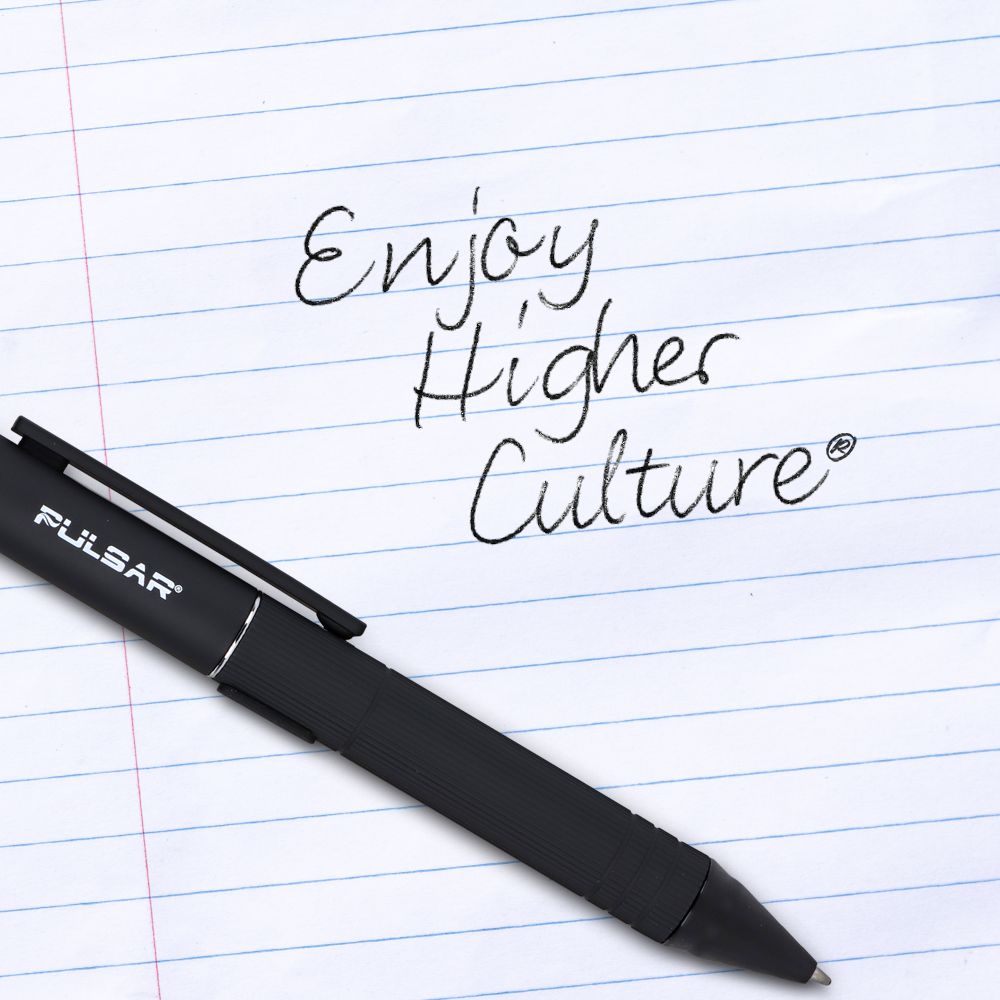 The Pulsar 510 DL Scribe in Black resting on a piece of white paper with the handwritten phrase "enjoy higher culture," demonstrating its dual-functionality as a legitimate writing instrument and a discreet vaporizer.