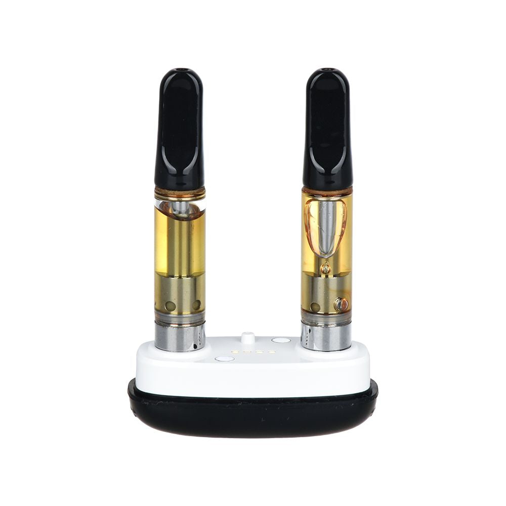 Pulsar 510 DL Tandem magnetic base showing the dual 510-thread chambers, magnetic loading system, and independent heating elements for two cartridges.