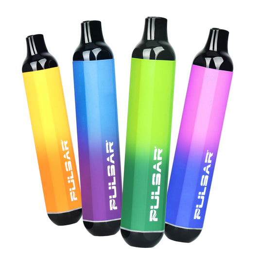 A clean studio product lineup showcasing four colorways of the Pulsar 510 DL Thermo vape pen in their cold, resting states. Displayed side-by-side are the smooth, minimalist bar-style devices in their initial solid base finishes: vibrant Orange, rich deep Purple, dark Hunter Green, and royal Midnight Blue.