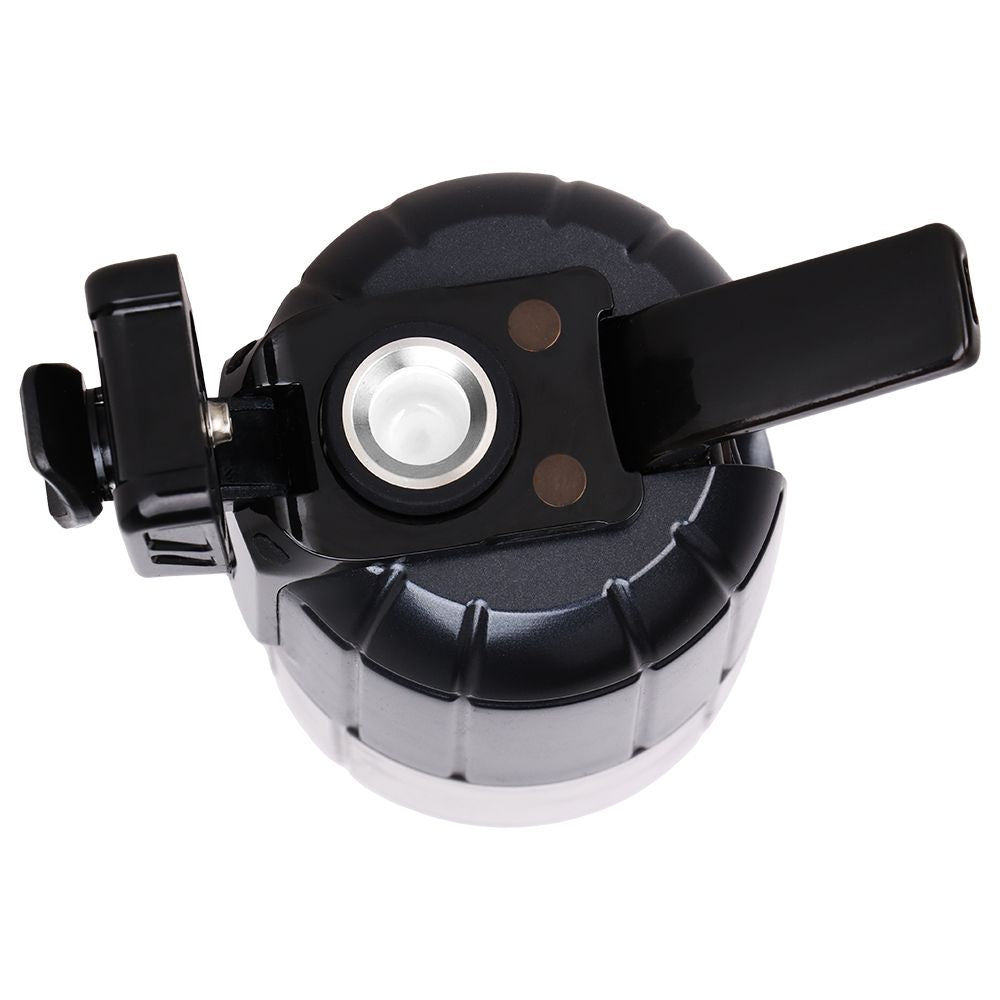 A crisp, top-down studio product shot of the Pulsar Dabtron 2.0 eRig in Jet Black with the magnetic chamber lid removed. This close-up angle peers directly down into the heating chamber, highlighting the white 360-degree surround ceramic atomizer dish where wax concentrates are loaded.