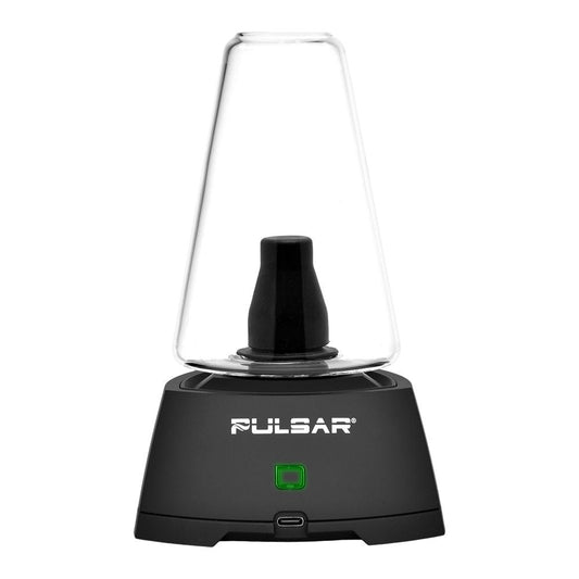 A front-facing studio shot of the Pulsar Sipper Dual Use Vaporizer in Black. The image shows the sleek, matte black base with its circular touchpad interface and LED light ring, topped with the signature clear "dry cup" glass. 