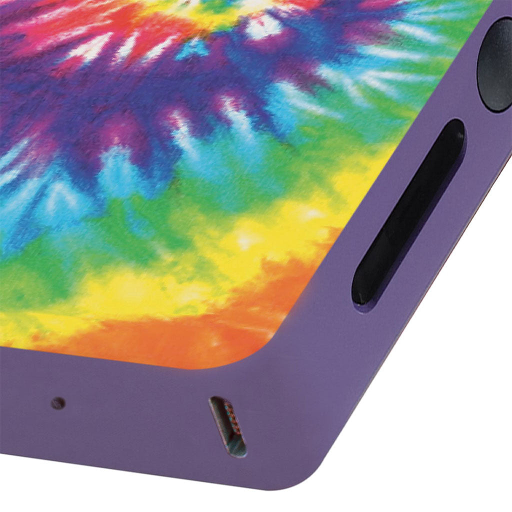 Close-up of the Tie-Dye RYOT Verb 510 thread battery showing the vibrant multi-color print, side viewing window, and bottom charging port.