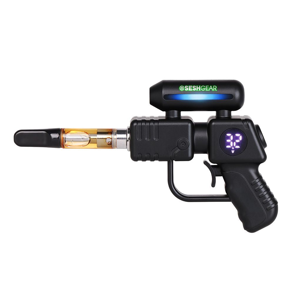 SeshGear Ray Gun in Black, featuring the unique ergonomic "pistol grip" design, an installed 510 cartridge, and the LED screen showing the current voltage setting.
