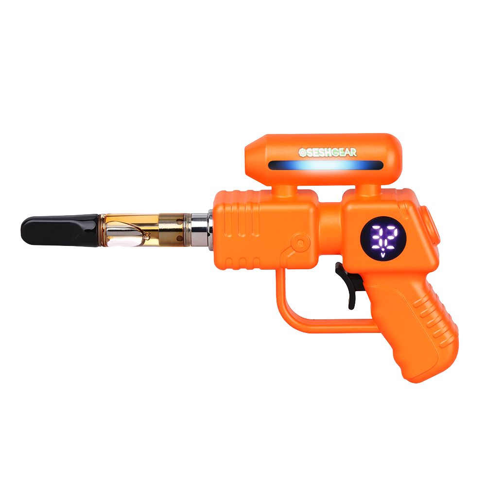 SeshGear Ray Gun in Orange, featuring the built-in LED display screen and a 510-thread cartridge installed for use, making it the most unique novelty battery on the market.