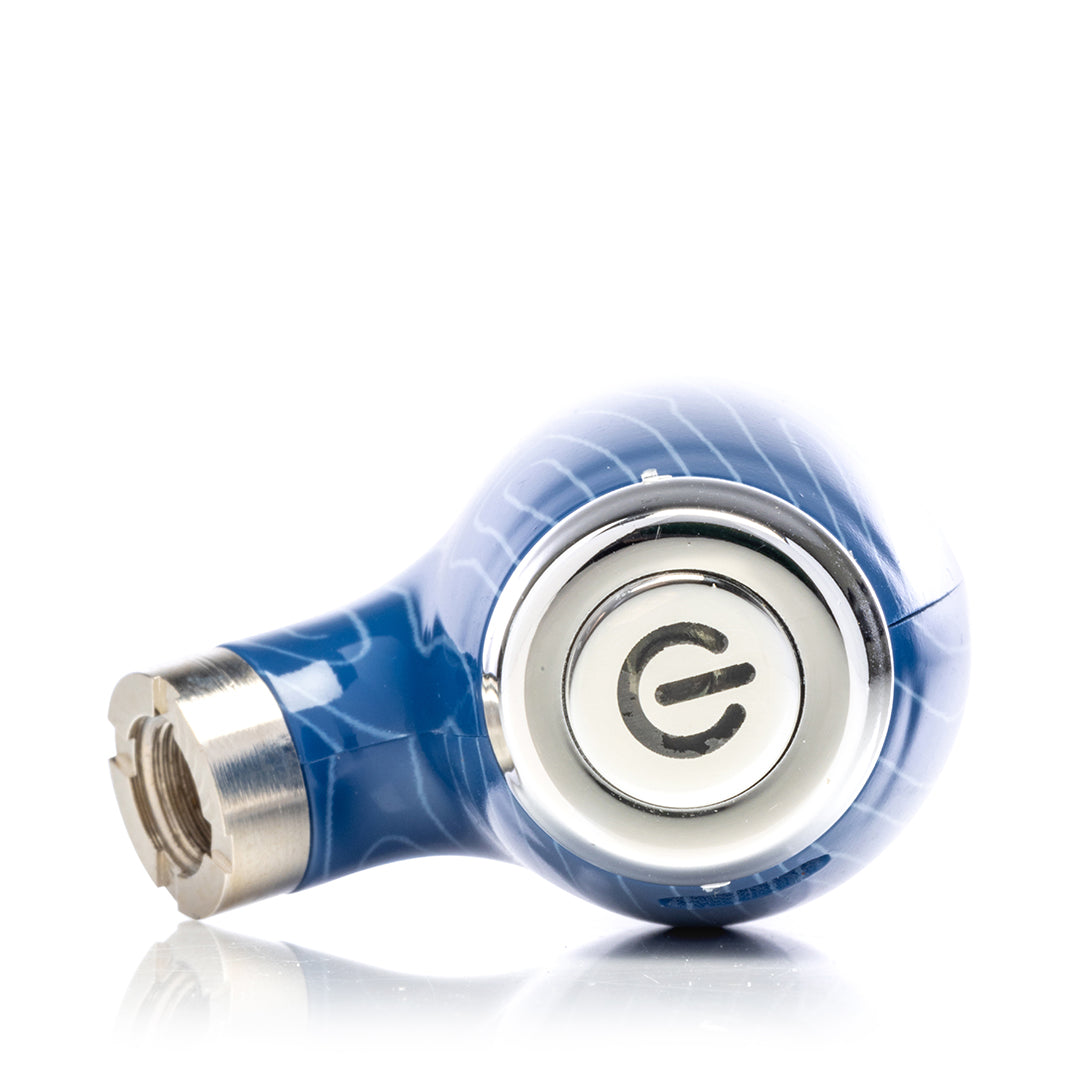 Close-up of the silver-trimmed power button on a blue 510 thread pipe battery, featuring a universal power symbol for easy operation and voltage control.