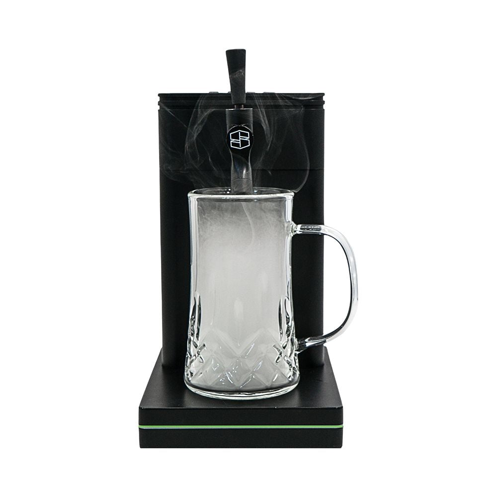 A crystal-glass mug sitting on the Stache Terp Tap base, filled with thick, white vapor poured from the tap spout.