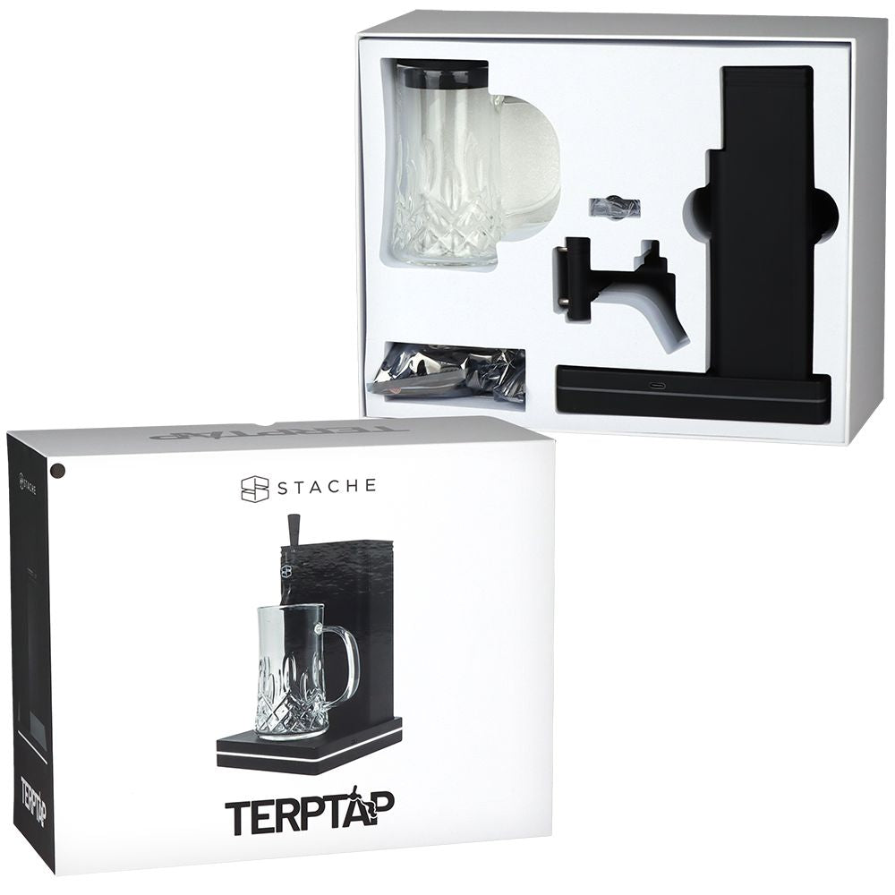 The Stache Terp Tap unboxed, showing the tabletop unit, glass cup, and interchangeable spout neatly organized in protective foam packaging.