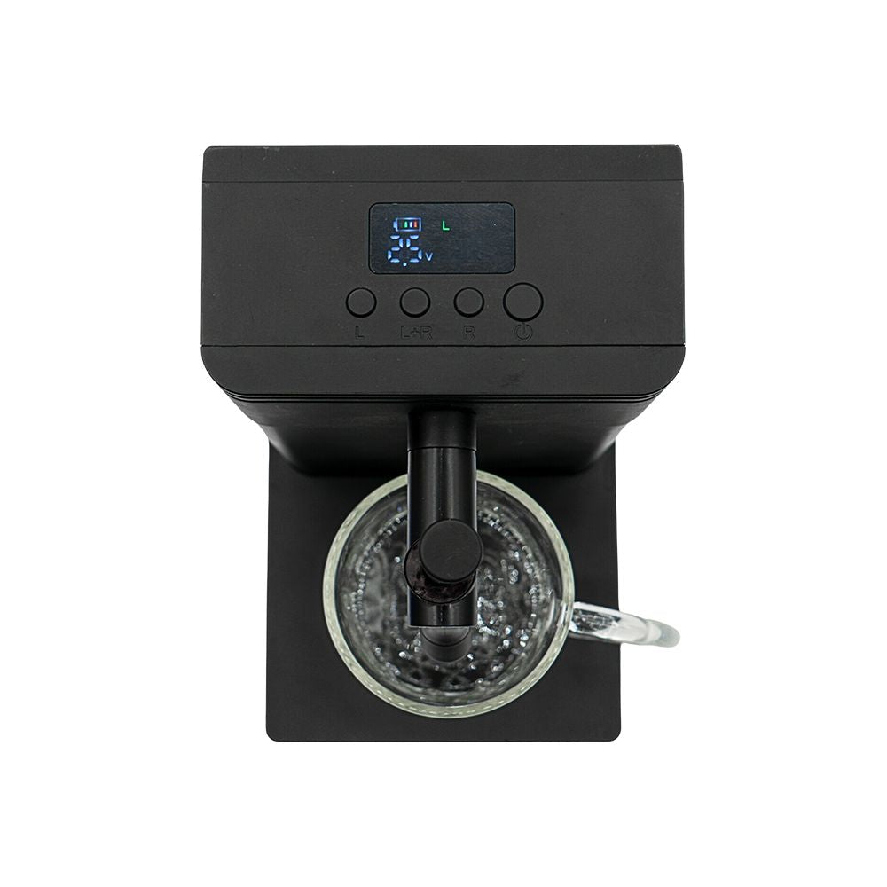 Top-down view of the Stache Terp Tap interface, showing the digital LCD screen displaying voltage and battery life alongside four tactile control buttons."