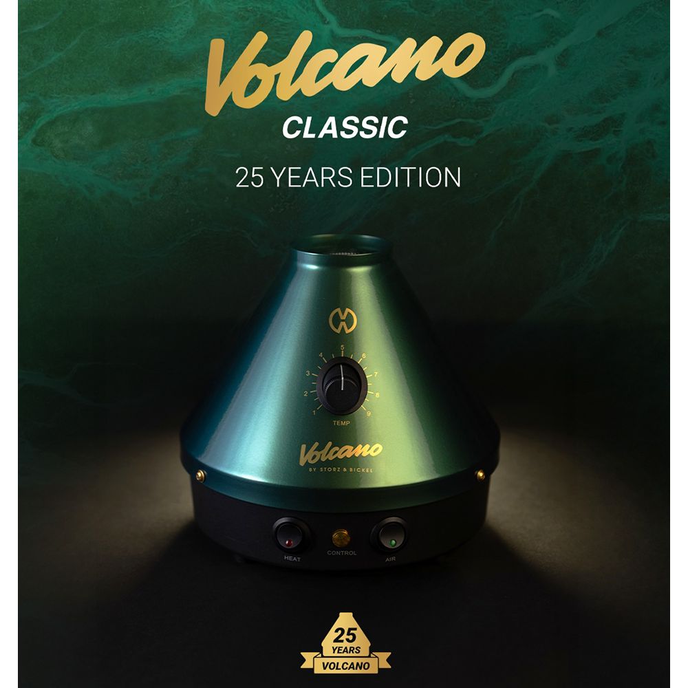 A crisp, front-facing studio display of the Storz & Bickel 25-Year Limited Edition Volcano Classic featuring clean promotional graphic overlays. Above the matte green and gold conical desktop device, the official bold white Volcano logo is prominently displayed, accented by clean typography below reading "Classic" and "25 Year Edition" to highlight its rare collector-tier anniversary status.
